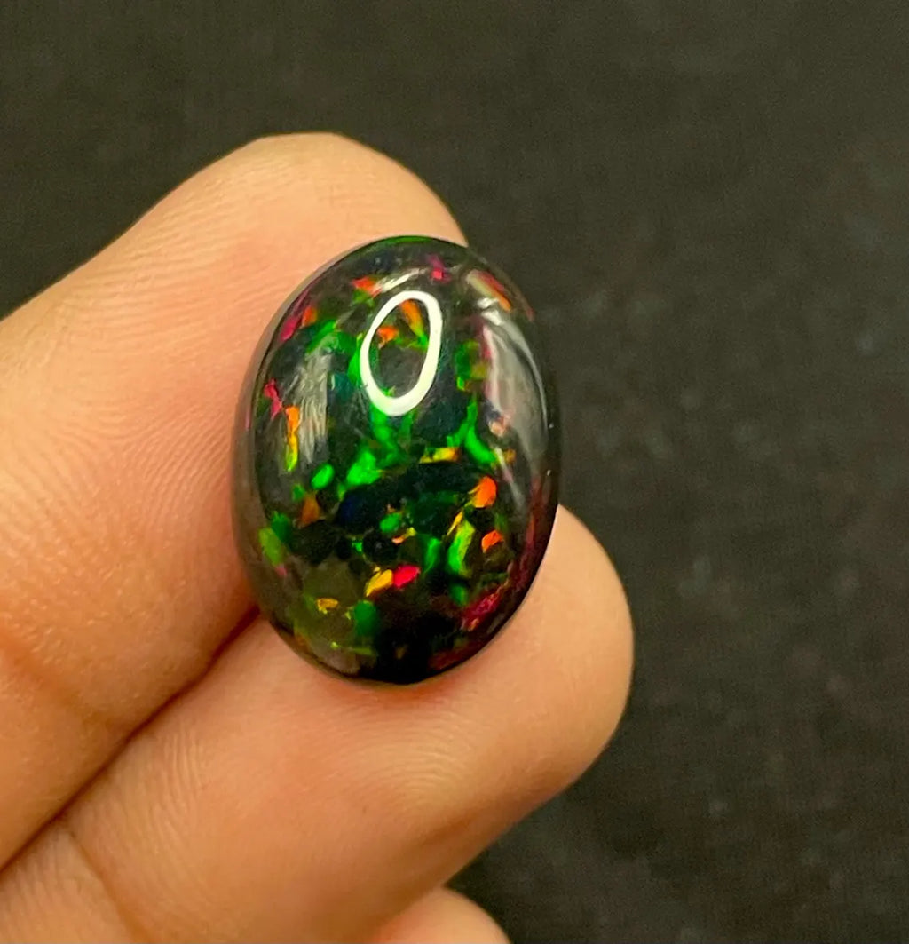 Natural Ethiopian Black Fire Opal – 8.10 CT Oval Cabochon | Welo Origin