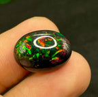 Natural Ethiopian Black Fire Opal – 8.10 CT Oval Cabochon | Welo Origin