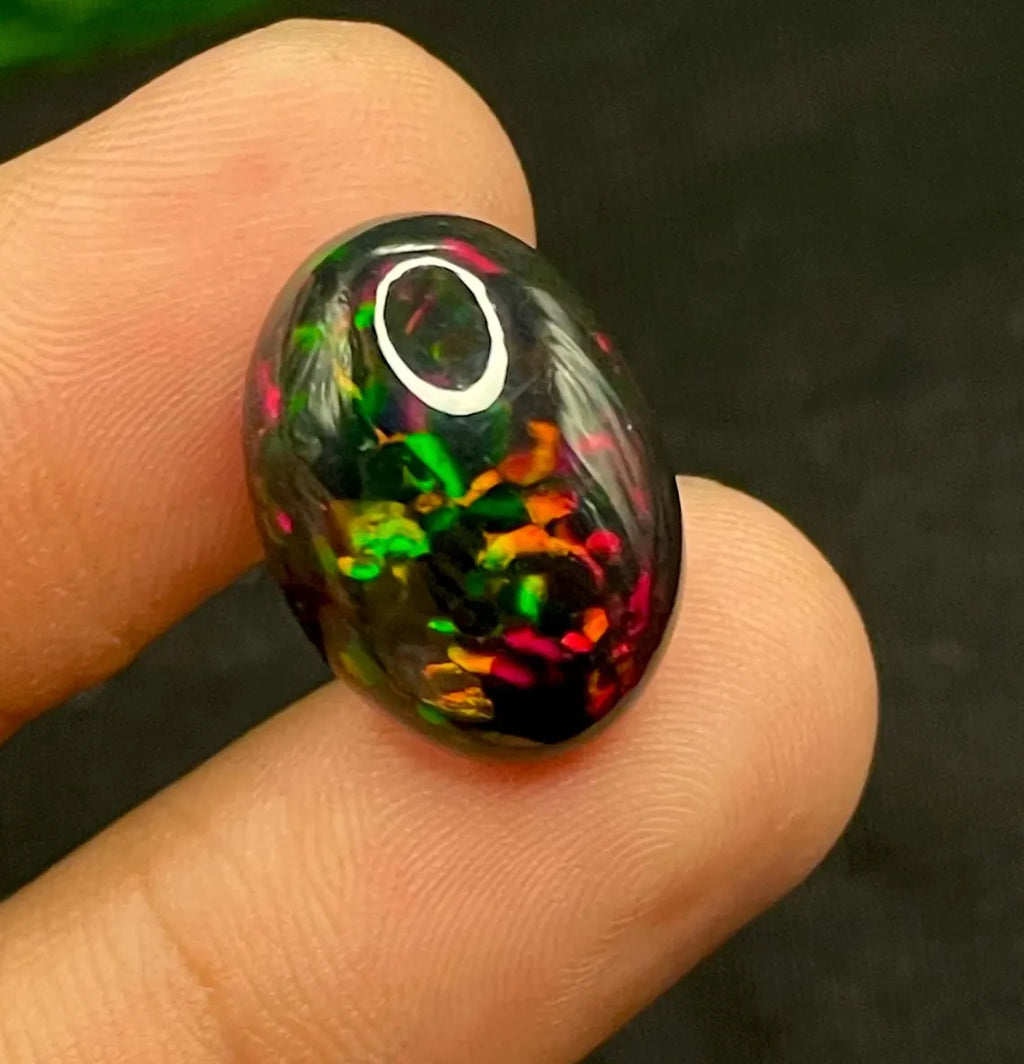 Natural Ethiopian Black Fire Opal – 8.10 CT Oval Cabochon | Welo Origin